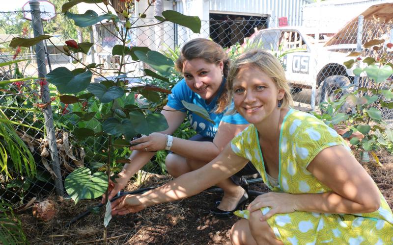LWS staff member checking leak with resident